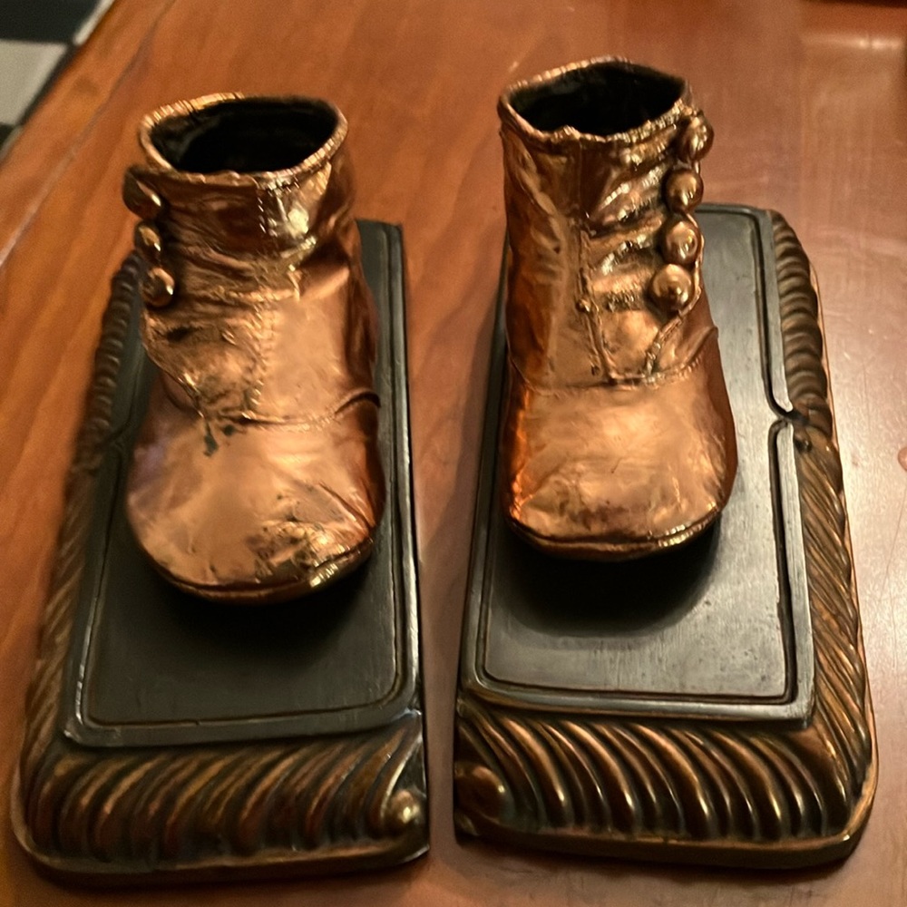 These Vintage baby shoes/book ends, so adorable/precious